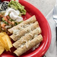 Tres Taquitos (Flautas) Plate · Tres chicken or beef rolled tortillas, deep fried and served with rice and beans (black or p...