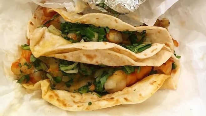 Shrimp Taco · Onion and Cilantro mix served on corn Tortilla,Choice of red or green salsa
