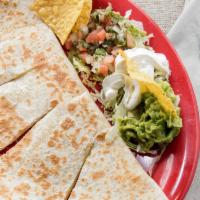 Quesadilla · Choice of meat and served with guacamole, pico de gallo and sour cream on the side served wi...
