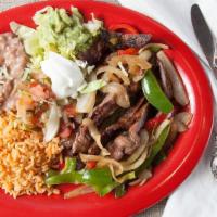 Steak Fajitas · Served with grilled bell peppers, onions and jalapenos, with rice, beans, sour cream, guacam...