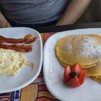 Pancakes Combo · Two eggs & bacon or ham or sausage