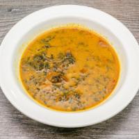 Ogbono Soup · Made with pumpkin leaf, bitter leaf or Oha. Served with goat, beef or chicken and choice of ...