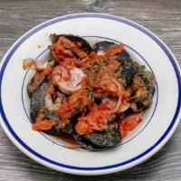 Fresh Snails · Cooked with sliced tomatoes, pepper and onions.