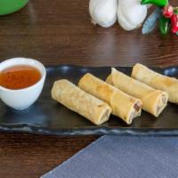 Spring Rolls · Shredded cabbage, carrots and transparent noodles, wrapped in an egg roll shell and served w...