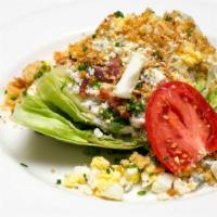 Classic Wedge Salad · tomato, bacon, red onion, croutons, blue cheese crumbles, herb vinaigrette, blue cheese dres...