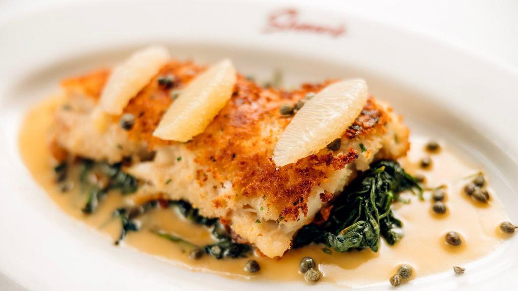 Parmesan Crusted George’S Bank Haddock · Capers, sautéed spinach, lemon butter.