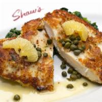 Parmesan Crusted Chicken · All natural chicken breasts, sautéed spinach, capers, lemon butter.