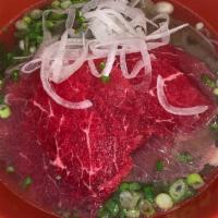 Phở Tái · Rice noodle soup with fresh sliced beef.
