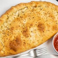 Calzone · Crisp baked Italian turnover with Masi's Pizza sauce, Mozzarella cheese & choice of ingredie...