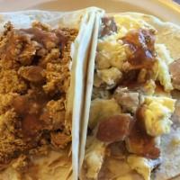 Barbacoa Taco · Authentic Mexican taco on warm corn tortilla with onions and cilantro!.