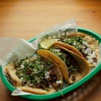 Taco Dinner · 3 Tacos of your choice, INCLUDES  rice and beans.
All tacos include Onions and Cilantro! Let...