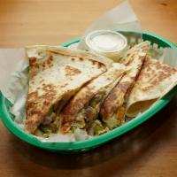 Large Cheese Quesadilla · Delicious warm and melted cheese on a large fresh four tortilla!