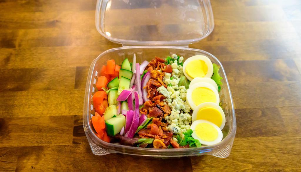Cobb Salad · Tomato, Cucumber, Red Onion, Bacon, Hard Boiled Egg, Blue Cheese