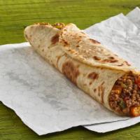 Picadillo Taco · Seasoned ground beef cooked with chopped tomatoes, peppers, onions and diced potatoes.