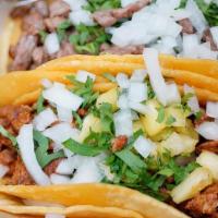 Taco · (corn tortilla cilantro and onion)