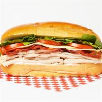 Turkey · Sliced turkey with mozzarella, mayo, tomatoes, and lettuce on a hoagie roll.