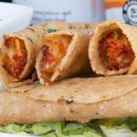 Chicken Tinga Taquitos (Gf) · Perez corn tortillas stuffed with our signature cheese blend and spicy marinated chicken the...