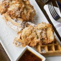 Chicken & Waffles · Brown butter waffle, buttermilk fried chicken tenders, roasted jalapeño syrup, whiskey butter.