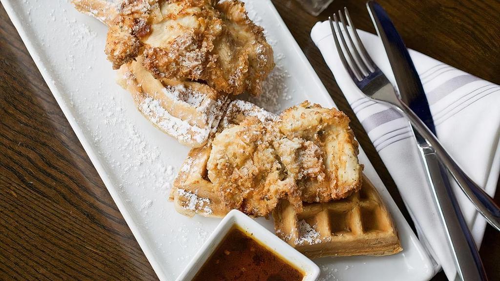 Chicken & Waffles · Brown butter waffle, buttermilk fried chicken tenders, roasted jalapeño syrup, whiskey butter.