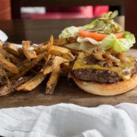 Whiskey Burger · Black Angus beef, cheddar cheese, caramelized shallots and whiskey glaze on a freshly baked ...