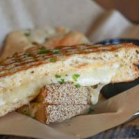 Nyc Grilled Cheese · SMOKED GOUDA & HAVARTI ON JALAPENO CORNBREAD W/ & GHOST PEPPER SAUCE