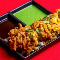 Paneer Pakora · Homemade cottage cheese marinated with chickpeas flour and deep fried.