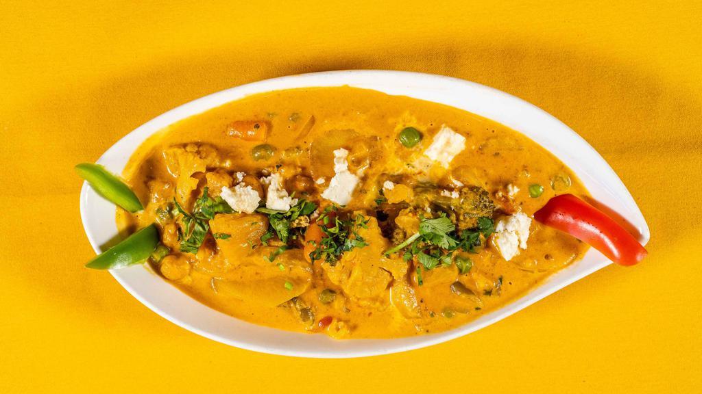 Vegetable Korma · Hearty mixed vegetables cooked in a rich cream and almond sauce.