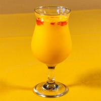 Mango Lassi · Our signature refreshing yogurt drink combined with mango pulp.