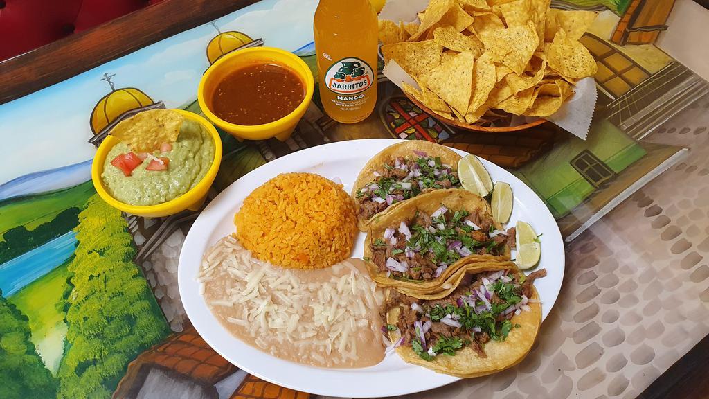 Taco Dinner · Three soft corn tortillas.  Mexican Style (onions & cilantro) or American Style (lettuce and tomato) & your choice of meat.