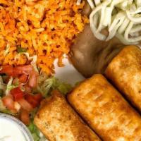 Chimichanga Dinner · Dinner-Three Flour Tortillas fried, filled with cheese and  your choice of meat . Served wit...
