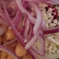 Large Greek Salad · Feta Cheese,Tomato,Cucumber<red onion,Beets,Chick Peas,Olives & Pepperoncini