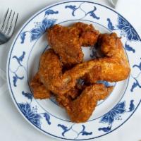 Fried Chicken Wings · Four wings.