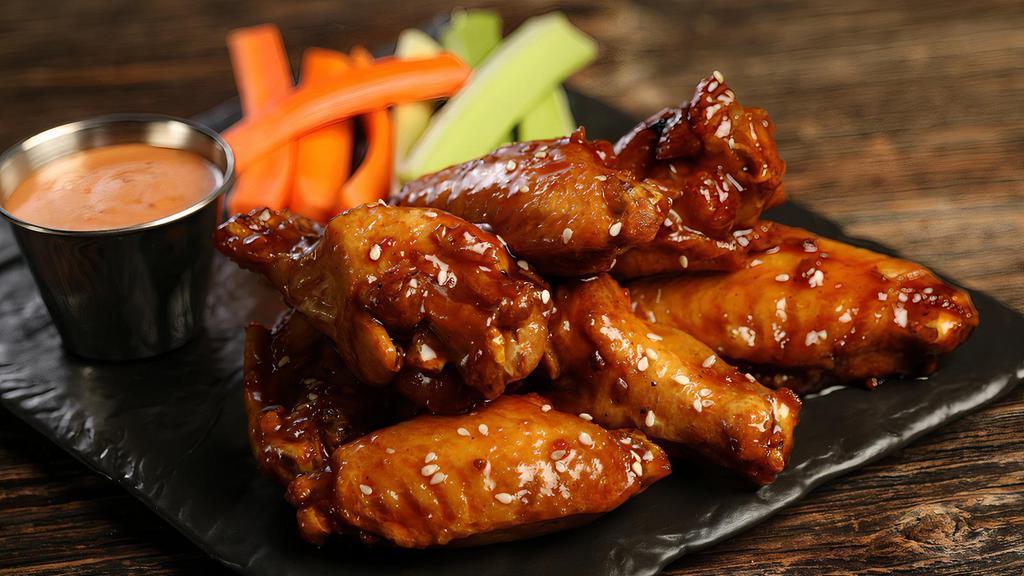Korean Bbq · 8 Korean BBQ wings (mild heat), served with carrots & celery and a choice of blue cheese, classic ranch, or Sriracha ranch for dipping
