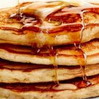 Pancakes With Syrup · Three large buttermilk pancakes made fresh to order.