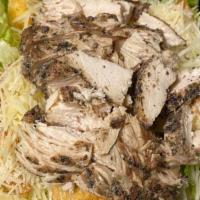 Chicken Caesar Salad · Crispy romaine lettuce topped with marinated grilled chicken breast, homemade seasoned crout...