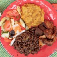 Tasso Goat/ Beef  · goat or beef with plantains and spicy cabbage  and side salad