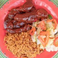 Pork Ribs  · pork ribs with rice and spicy cabbage and side salad