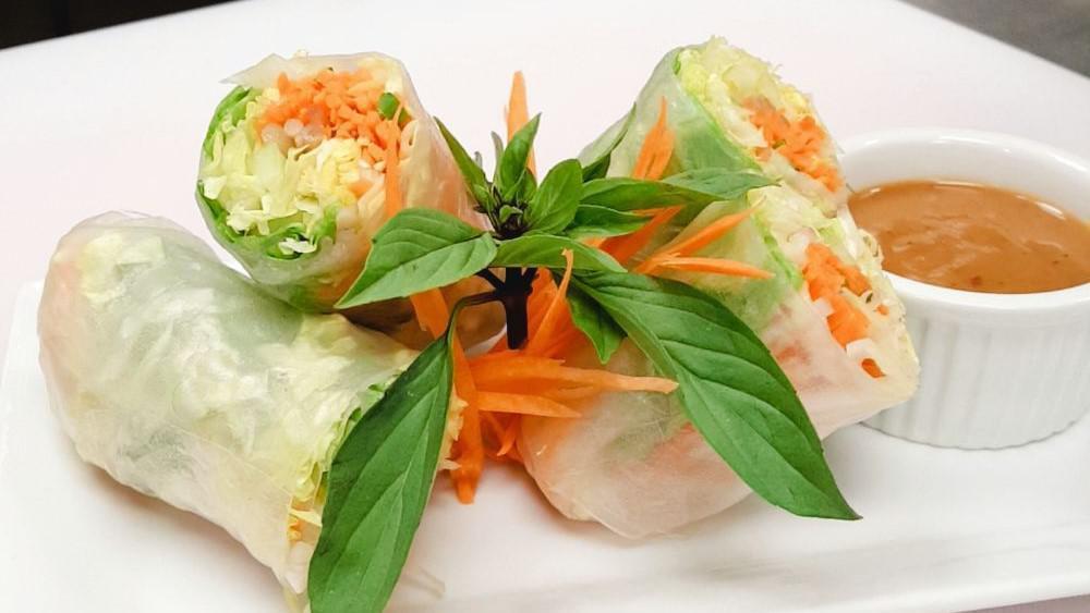Thai House Fresh Rolls (2 Large Rolls) · Lettuce, bean sprouts, carrots, cucumber, and cilantro wrapped in a fresh rice paper. Served with homemade peanut sauce.