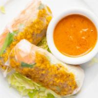 Thai Fresh Spring Rolls · Chicken, carrots, rice noodles and basil wrapped in fresh rice paper and served with peanut ...