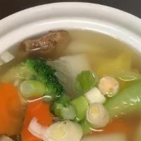 Vegetable Soup · Mixed vegetables, tofu and mushrooms in a clear broth, with scallion garnish.