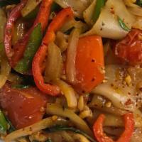 Pad Kee Mao · Wide rice noodles cooked with chili basil, tomatoes, onions and bell peppers.