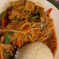 Pad Phed · Red chili paste cooked with bamboo shoots, onions, green and red bell peppers.