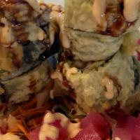 Heart Attack · Spicy tuna, cream cheese, jalapeño, drizzled with eel sauce and spicy mayo, the whole roll i...