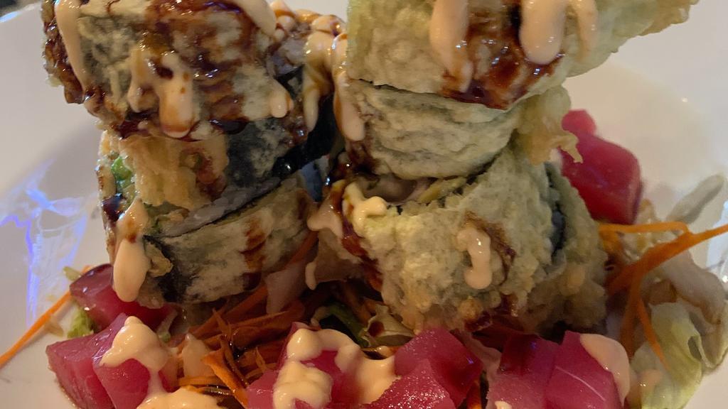 Heart Attack · Spicy tuna, cream cheese, jalapeño, drizzled with eel sauce and spicy mayo, the whole roll is then deep fried.