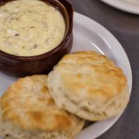 Biscuits & Sausage Gravy · Two large buttermilk biscuits served with a generous portion of our homemade sausage gravy.