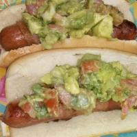 Cali Hot Dog · All beef hot dog wrapped in bacon, topped with guacamole, served on a bun.