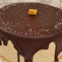Salted Caramel · Chocolate cake iced with caramel buttercream icing, topped with chocolate drip.