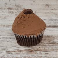 Peanut Butter Cup · Chocolate cake filled with fluffy peanut butter filling, topped with chocolate icing.