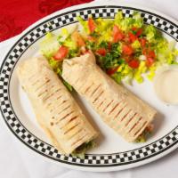 Falafel · Five pieces of falafel, tomatoes, pickles, onions, tahini dressing wrapped in large shrak br...