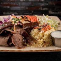 Gyro Platter · Your choice of rotisserie meat served with orzo rice, seasonal vegetables, and side of tzatz...